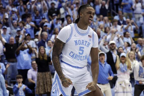 North Carolina forward Armando Bacot reacts after he dunked against Duke during the first half of an NCAA college basketball game Saturday, March 4, 2023, in Chapel Hill, N.C. (AP Photo/Chris Seward)