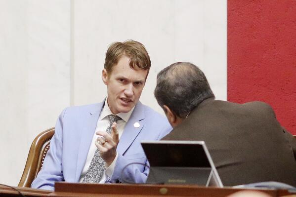 FILE - State Sen. Stephen Baldwin, D-Greenbrier, speaks with fellow senator Mike Romano, D-Harrison, during the opening day of the state legislative session, Wednesday, Jan. 8, 2020, in Charleston, W.Va. Baldwin said he was “ashamed” after a foster care bill died on the final day of the 2022 session. (AP Photo/Chris Jackson, File)