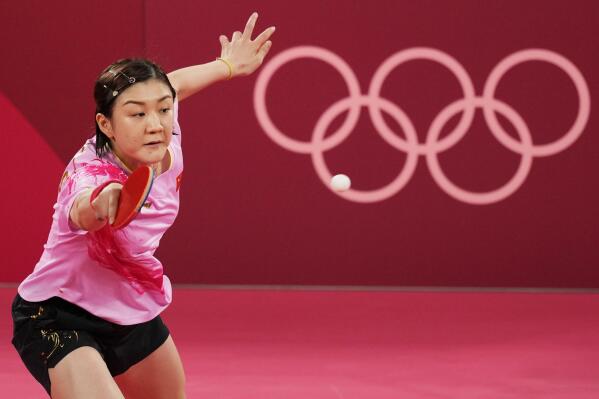 China's Chen Meng competes against countrywoman Sun Yingsha during the gold medal match of the table tennis women's singles at the 2020 Summer Olympics, Thursday, July 29, 2021, in Tokyo. (AP Photo/Kin Cheung)