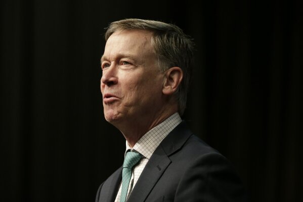 
              FILE - In this April 5, 2019, file photo, Democratic president candidate, former Colorado Gov. John Hickenlooper, speaks during the National Action Network Convention in New York. Many white Democratic presidential candidates are speaking more candidly about systemic race and white privilege. It’s becoming what one strategist calls a “woke litmus test” for any white person who wants to win the 2020 Democratic presidential nomination. (AP Photo/Seth Wenig, File)
            