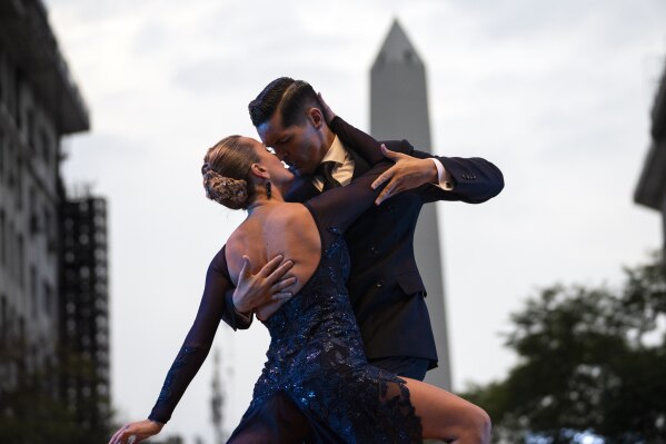 Evgeniia Samoilova and Luis Squicciarini compete in the Tango World Championship final round of the salon category, in Buenos Aires, Argentina, Saturday, Sept. 2, 2023. (AP Photo/Rodrigo Abd)