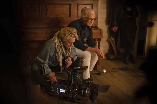 This image released by Netflix shows cinematographer Ari Wegner, left, with producer-director Jane Campion on the set of "The Power of the Dog." (Netflix via AP)