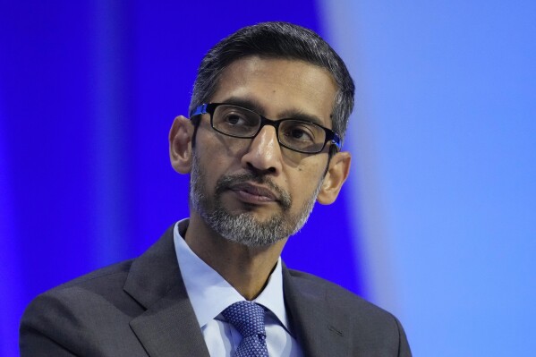 File - Sundar Pichai, CEO of Google and Alphabet, takes part in a discussion at the Asia-Pacific Economic Cooperation (APEC) CEO Summit Nov. 16, 2023, in San Francisco. A federal court jury is expected to begin its deliberations Monday, Dec. 11, 2023, in an antitrust trial focused on whether Google's efforts to thwart competition against its app store for Android smartphones has also been illegally gouging consumers and stifling innovation.(AP Photo/Eric Risberg, File)