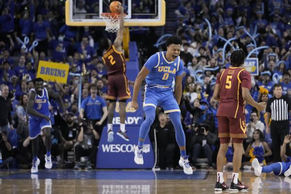UCLA's Jaylen Clark (0) reacts after a foul call against Southern California during the second half of an NCAA college basketball game in Los Angeles, Thursday, Jan. 5, 2023. (AP Photo/Jae C. Hong)