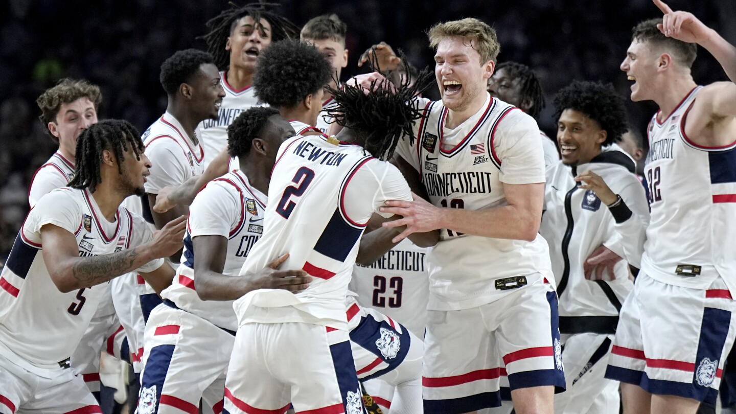 UConn concludes a dominant run to its 2nd straight NCAA title, beating Zach Edey and Purdue 75-60