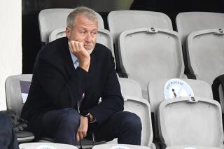 FILE - Chelsea soccer club owner Roman Abramovich attends the UEFA Women's Champions League final soccer match in Gothenburg, Sweden on Sunday, May 16, 2021. Abramovich, a former Russian provincial governor and Vladimir Putin ally who became a steel and metals magnate, is now a dual Israeli citizen with a net worth estimated at more than $13 billion. He has used his fortune to buy the British soccer club Chelsea and homes in London and New York. (AP Photo/Martin Meissner, File)