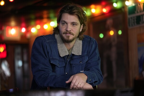 Actor-singer Luke Grimes poses for a portrait Tuesday, Feb. 20, 2024, in Nashville, Tenn. Grimes, best-known for his portrayal of the complex cowboy character Kayce Dutton on the hit show “Yellowstone,” will release his self-titled debut album on Friday. (AP Photo/George Walker IV)