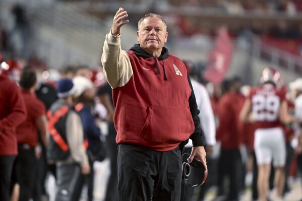 Arkansas coach Sam Pittman gestures during the first half of the team's NCAA college football game against Florida International on Saturday, Nov. 18, 2023, in Fayetteville, Ark. (AP Photo/Michael Woods)