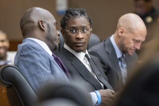 FILE - Young Thug attends a hearing on the YSL case in Atlanta on Dec. 22, 2022. Nearly 10 months after jury selection began, a panel of Georgia citizens was selected Wednesday, Nov. 1, 2023, for the trial of rapper Young Thug and several other people accused of participating in a criminal street gang responsible for violent crimes. (Arvin Temkar/Atlanta Journal-Constitution via AP, File)