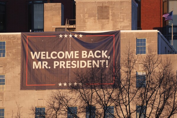 A sign is seen near St. John’s Episcopal Church across from the White House in Washington, Monday, Jan. 20, 2025, where President-elect Donald Trump and his wife Melania will attend an early morning service to start Trump’s inauguration day. (AP Photo/Matt Rourke)