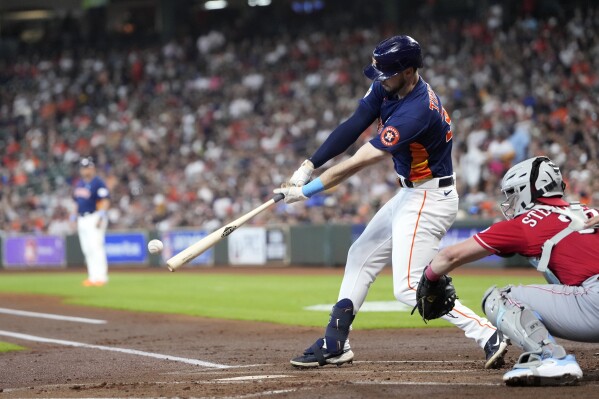 Reds push win streak to 7 with 10-3 win over Astros