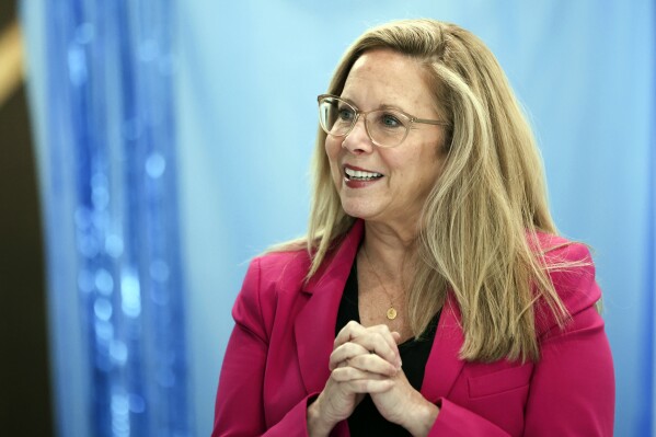 Laura Gillen, Democratic candidate for New York's 4th Congressional District, reacts before a roundtable discussion outlining her policy platform to lower healthcare costs for Latino families, Thursday, Oct. 24, 2024, in Freeport, N.Y. (AP Photo/Heather Khalifa)