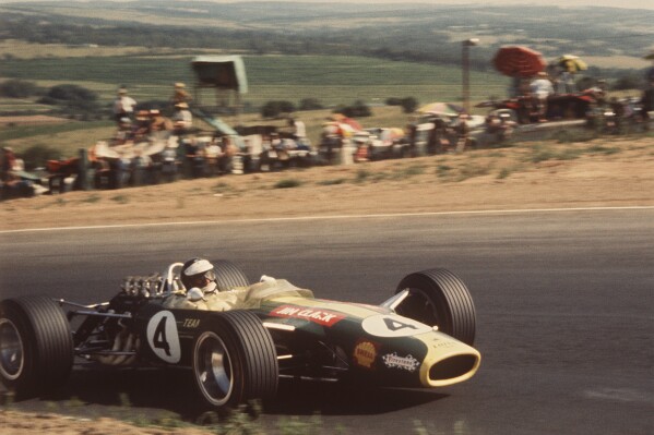 Two-time world champion driver Jim Clark of Scotland drives his Lotus 49 during the South African Grand Prix at Kyalami circuit, Jan. 1, 1968. (AP Photo, File)