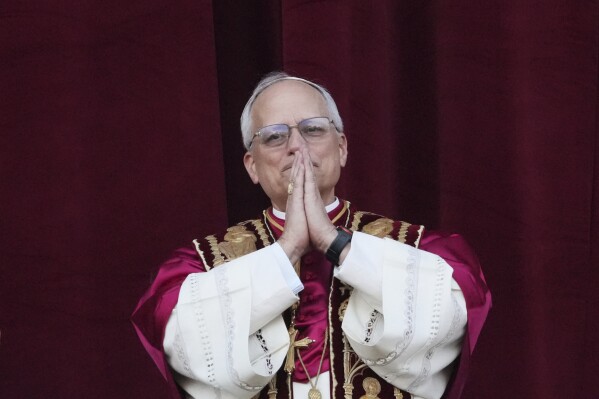 Newly elected Pope Leo XIV appears at the balcony of St. Peter's Basilica at the Vatican, May 8, 2025. (AP Photo/Alessandra Tarantino)