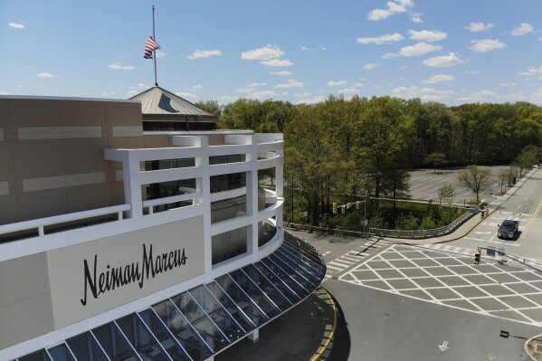 A closed Neiman Marcus store is seen at the Garden State Plaza mall in Paramus, N.J., Thursday, May 7, 2020. Neiman Marcus filed for Chapter 11 bankruptcy protection, sounding an ominous note for department stores during the coronavirus pandemic. (AP Photo/Seth Wenig)