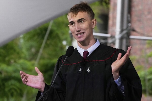 Thor Reimann addresses graduates during commencement ceremonies at Harvard University, Thursday, May 29, 2025, in Cambridge, Mass. (AP Photo/Charles Krupa)