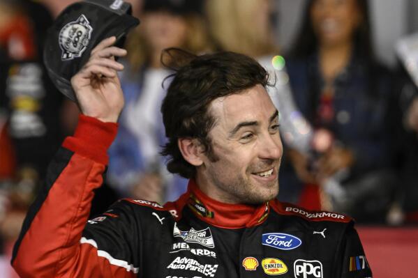 Ryan Blaney smiles in Victory Lane after winning a NASCAR Cup Series auto race at Charlotte Motor Speedway, Monday, May 29, 2023, in Concord, N.C. (AP Photo/Matt Kelley)