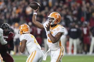 Tennessee quarterback Hendon Hooker (5) throws a short pass during the first half of the team's NCAA college football game against South Carolina on Saturday, Nov. 19, 2022, in Columbia, S.C. (AP Photo/Artie Walker Jr.)