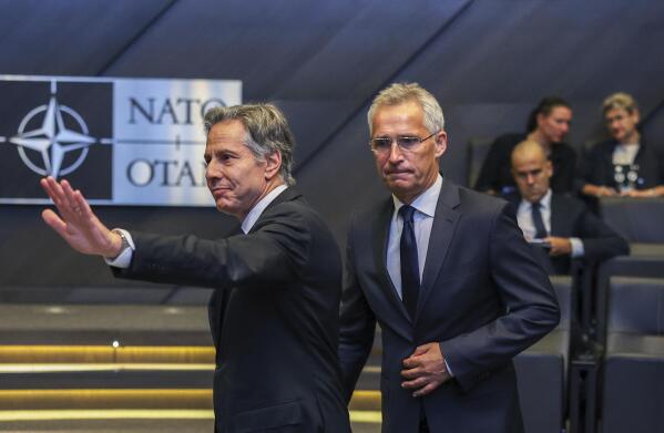 NATO Secretary General Jens Stoltenberg, center, and US Secretary of State Antony Blinken, left, arrive for a meeting of NATO ambassadors at NATO headquarters in Brussels, Friday, Sept. 9, 2022. (AP Photo/Olivier Matthys, Pool)