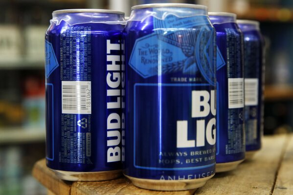 
              This Thursday, Jan. 10, 2019, photo shows cans of Bud Light in Washington. Starting next month, packages of Bud Light will have prominent labels showing the beer’s ingredients and calories as well as the amount of fat, carbohydrates and protein in a serving.  Bud Light is likely the first of many to make the move. The labels aren’t legally required, but major beer makers agreed in 2016 to voluntarily disclose nutrition facts on their products by 2020. (AP Photo/Jacquelyn Martin)
            