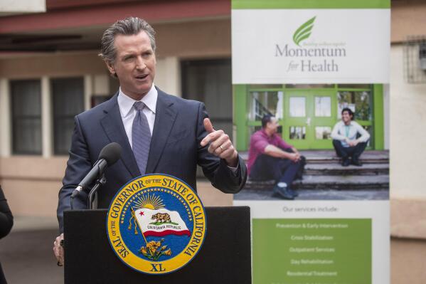 Gov. Gavin Newsom, speaking at a mental health treatment center in San Jose, Calif., announces "Care Court," a program that would target people suffering from psychosis who have lost their ability to care for themselves, Thursday, March 3, 2022. California's governor is proposing a plan to offer more services to homeless people with severe mental health and addiction disorders even if that means forcing some into care. (Karl Mondon/Bay Area News Group via AP)
