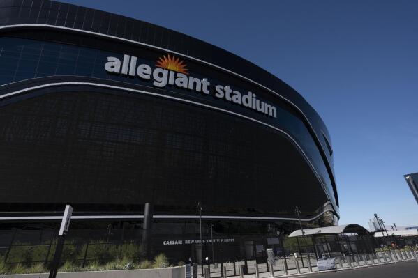 FILE - The exterior of Allegiant Stadium appears in Las Vegas on Nov. 14, 2021. The Academy of Country Music awards show will be held at the new 65,000-seat Allegiant Stadium in Las Vegas. The country music awards show will be held on March 7 and exclusively live-streamed on Amazon Prime Video. (AP Photo/John McCoy, File)