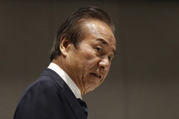 FILE - Haruyuki Takahashi, executive board member of the Tokyo Organizing Committee of the Olympic and Paralympic Games arrives at Tokyo 2020 Executive Board Meeting in Tokyo on March 30, 2020. Takahashi, a former member of the Tokyo Olympic organizing committee, appeared in a Tokyo district court for the first time on Thursday, Dec. 14, 2023, to face charges of taking millions in bribes tied to the Games. He was arrested more than a year ago and its unclear when his trial will end. (Issei Kato/Pool Photo via AP, Pool, File)