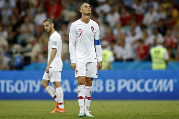 
              Portugal's Cristiano Ronaldo reacts disappointed during the round of 16 match between Uruguay and Portugal at the 2018 soccer World Cup at the Fisht Stadium in Sochi, Russia, Saturday, June 30, 2018. (AP Photo/Francisco Seco)
            