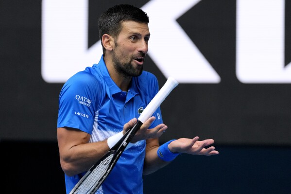 Djokovic one-ups Federer in Grand Slam matches | AP News