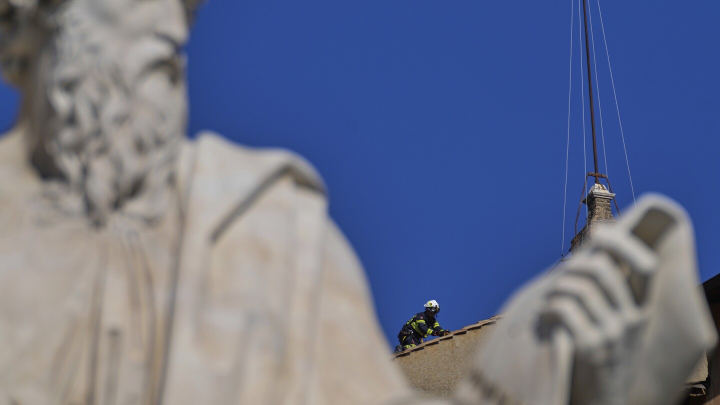 Papal Election: Vatican Firefighters Install Sistine Chapel Chimney
