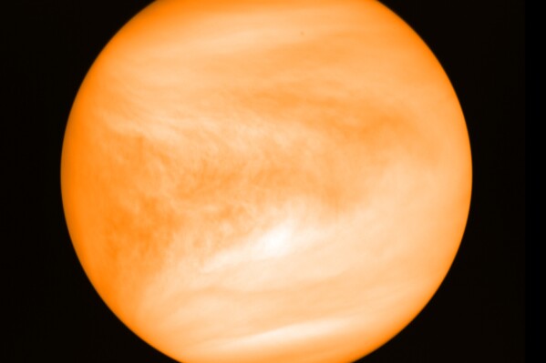 This photo provided by researcher Jane Greaves shows the planet Venus, seen from the Japan Aerospace Exploration Agency's Akatsuki probe in May 2016. (J. Greaves/Cardiff University/JAXA via AP)