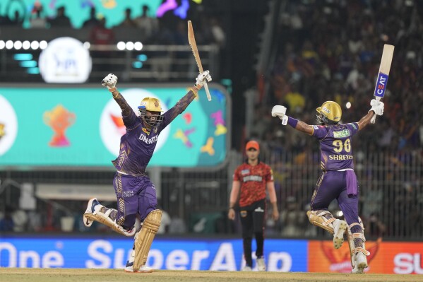 Kolkata Knight Riders' captain Shreyas Iyer , left, with teammate Venkatesh Iyer celebrate after wining against Sunrisers Hyderabad during the Indian Premier League cricket final match in Chennai, India, Sunday, May 26, 2024.(AP Photo/Mahesh Kumar A.)