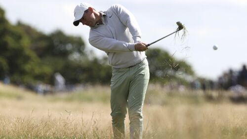 Northern Ireland's Rory McIlroy plays a shot on the 18th fairway on day one of the Genesis Scottish Open 2023 at The Renaissance Club, in North Berwick, Scotland, Thursday, July 13, 2023. (Steve Welsh/PA via AP)