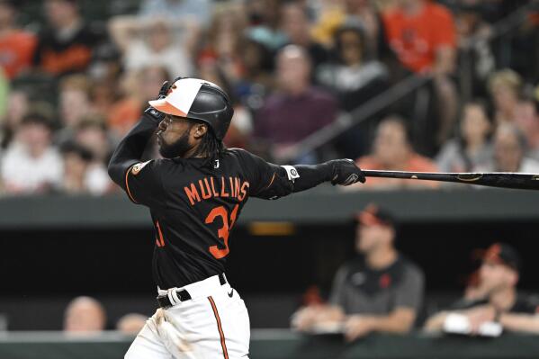 Cedric Mullins 31 Baltimore Orioles baseball player action pose