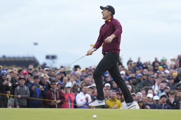 Justin Rose of England reacts after missing a putt on the 12th green during his final round of the British Open Golf Championships at Royal Troon golf club in Troon, Scotland, Sunday, July 21, 2024. (ĢӰԺ Photo/Jon Super)