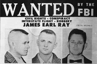 James Earl Ray is shown on an FBI poster, April 20, 1968.  Ray is being sought in connection with the sniper slaying of civil rights leader Dr. Martin Luther King, Jr.  (AP Photo)