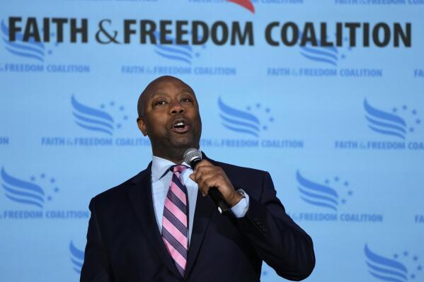 Sen. Tim Scott, R-S.C., speaks during the Iowa Faith and Freedom Coalition Spring Kick-Off Saturday, April 22, 2023, in Clive, Iowa. (AP Photo/Charlie Neibergall)