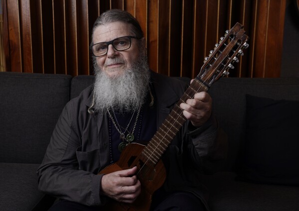 Composer Gustavo Santaolalla, a recipient of one of this year's Latin Grammys Trustees Awards, poses for a portrait in his home studio, Thursday, Aug. 17, 2023, in Los Angeles. (AP Photo/Chris Pizzello)