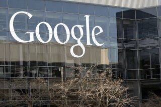 FILE - This Thursday, Jan. 3, 2013, file photo shows Google's headquarters in Mountain View, Calif. Google said Thursday, Oct. 1, 2020, it will pay publishers $1 billion over the next three years for their news content. The internet search giant said it has signed agreements for its news partnership program with nearly 200 publications in Germany, Brazil, Argentina, Canada, the U.K. and Australia. (AP Photo/Marcio Jose Sanchez, File)