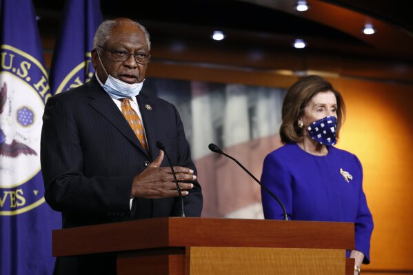 FILE - In this April 29, 2020, file photo House Majority Whip James Clyburn of S.C., speaks alongside House Speaker Nancy Pelosi of Calif., during a news conference to announce members of the House Select Committee on the Coronavirus Crisis on Capitol Hill in Washington. Clyburn is now the highest-ranking Black lawmaker in Congress, the House Democratic Whip, and one of the few leaders of civil rights movement still in elected office today. (AP Photo/Patrick Semansky, File)