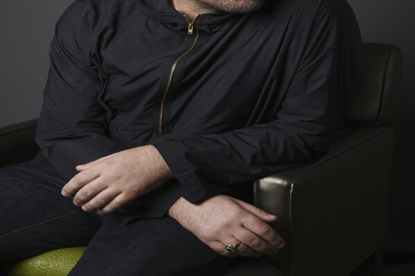 This Oct. 15, 2019 photo shows singer Liam Gallagher posing for a portrait at the Sunset Marquis Hotel in West Hollywood, Calif., to promote his sophomore solo album “Why Me? Why Not.” (Photo by Chris Pizzello/Invision/AP)