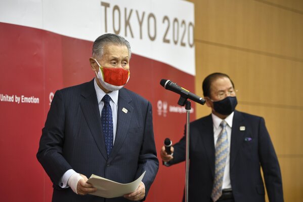 Tokyo 2020 President Yoshiro Mori, left, and CEO Toshiro Muto meet with the media after an opening plenary session of the three-party meeting on Tokyo 2020 Games additional costs due to the impact of the COVID-19 pandemic in Tokyo, Friday, Dec. 4, 2020. (Kazuhiro Nogi/Pool Photo via AP)
