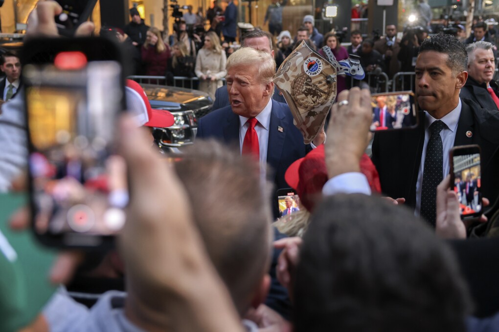 FILE - Former President Donald Trump speaks with construction workers at the construction site of the new JPMorgan Chase headquarters in midtown Manhattan, April 25, 2024, in New York. (AP Photo/Yuki Iwamura, File)