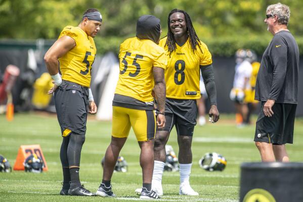 Steelers linebackers Alex Highsmith (56), Devin Bush (55), and Melvin Ingram (8) talk and laugh during training camp, Saturday, July 24, 2021, at the UPMC Rooney Sports Complex on the South Side in Pittsburgh. (Alexandra Wimley/Pittsburgh Post-Gazette via AP)