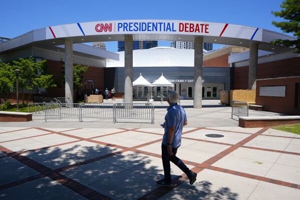 Signage outside the media file center for the upcoming presidential debate is seen at the CNN Techwood campus in Atlanta, Tuesday, June 25, 2024. President Joe Biden and Republican presidential candidate former President Donald Trump are slated to meet at the first debate of 2024 hosted by CNN. (AP Photo/Pablo Martinez Monsivais)