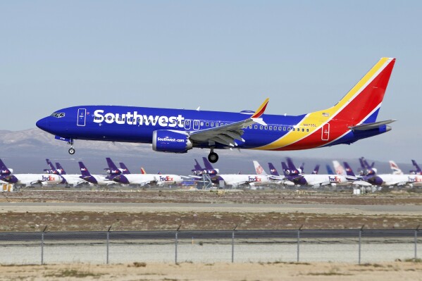 FILE - A Southwest Airlines Boeing 737 Max aircraft lands at the Southern California Logistics Airport on March 23, 2019, in Victorville, Calif. Southwest Airlines and its pilots reached a tentative labor agreement after three-and-a-half years of negotiations, the last of the four major airlines to reach a deal with pilots. The Dallas-based carrier said Tuesday, Dec. 19, 2023, it was pleased to reach the agreement in principle which it called a 