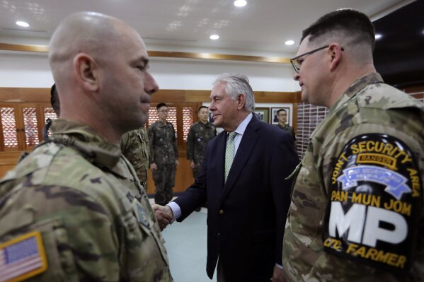 
              U.S. Secretary of State Rex Tillerson, center, meets with U.S. and South Korea soldiers before the lunch meeting at the Camp Bonifas near the border village of Panmunjom, which has separated the two Koreas since the Korean War, in Paju, South Korea, Friday, March 17, 2017. (AP Photo/Lee Jin-man, Pool)
            