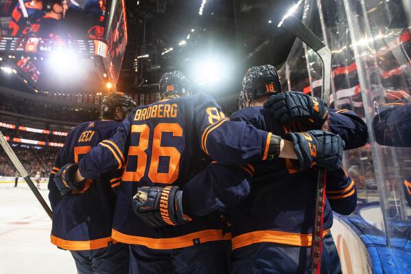 Edmonton Oilers celebrate a goal against the New York Islanders during the second period of an NHL hockey game Friday, Feb. 11, 2022, in Edmonton, Alberta. (Jason Franson/The Canadian Press via AP)