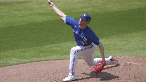 Toronto Blue Jays starting pitcher Chris Bassitt works against the San Diego Padres during the fourth inning of a baseball game in Toronto Thursday July 20, 2023. (Chris Young/The Canadian Press via AP)