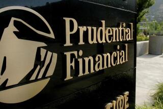 FILE - In this file photo taken Aug. 2, 2005, a Prudential Financial sign on the marquis direct customers to the company inside an office building in Salt Lake City. Prudential Financial illegally denied more than 200 life insurance claims despite collecting premiums from plan participants, the Department of Labor said Wednesday, April 19, 2023,the latest case where a life insurer was found to be denying claims even though the customer had been paying into the plan for years. (AP Photo/Douglas C. Pizac, File)